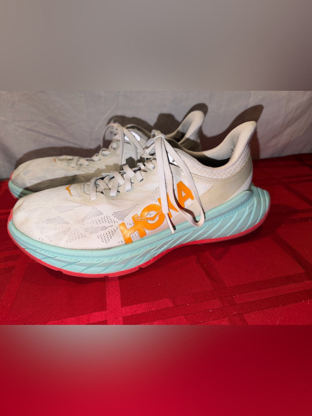 Hoka Women's White Running Shoes with Orange Logo and Aqua Midsole
